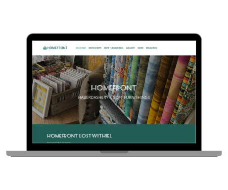 Homefront Lostwithiel Website By Rocket Media Services Laptop displaying a website with various patterned textiles and home décor items.
