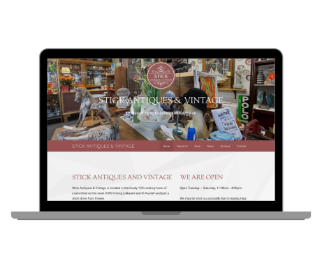 Stick Antiques And Vintage Website By Rocket Media Services A cozy shop interior filled with various antique items and decor.